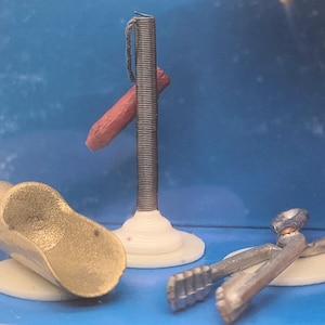 Dollhouse Miniature ~ 1:10 Scale, Dora Kuhn Cucumber Tongs & Shovel in Original Packaging