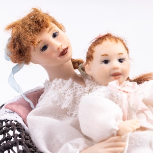 Dollhouse Miniatures~ Signed MT BT 1999 Mother & Baby Porcelain Dolls in Nightgowns Sitting in Brown Wicker Chair Artisan Made Nursery