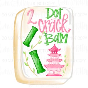 May include: A decorative tile featuring the text "2 Dot Crack Bam" in pink and green. The tile also includes green bamboo-like shapes, a pink pagoda, and decorative vines. The tile has a light beige border.