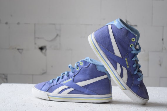 purple reebok high tops