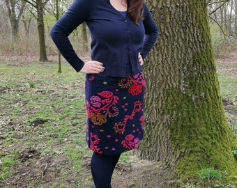 New* women's skirt made of walkloden in dark blue with red, pink and light green tendrils and dark blue cuffs. Available in every plus size.