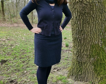 Women's skirt in blue made of curly fleece with blue cuffs. Available in every plus size.