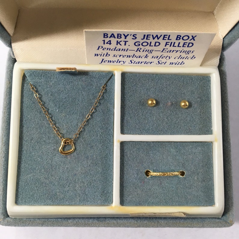 gold locket for new born baby