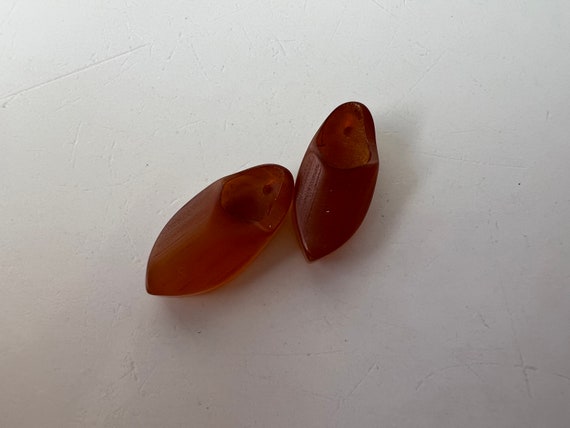 Lovely Old Carved Bakelite Button or Bead Pair if… - image 1