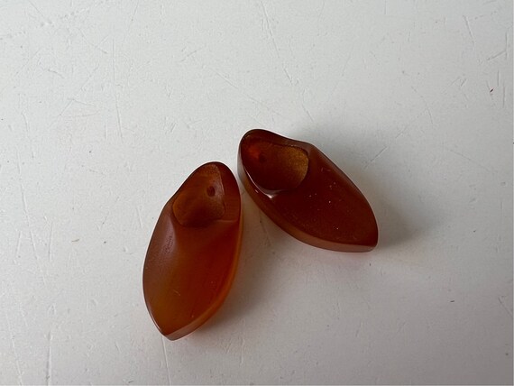 Lovely Old Carved Bakelite Button or Bead Pair if… - image 2