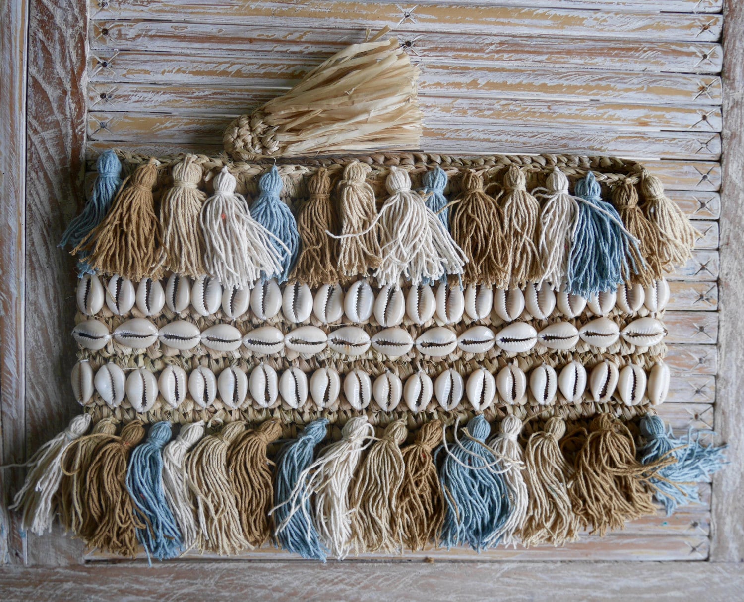 woven raffia clutch