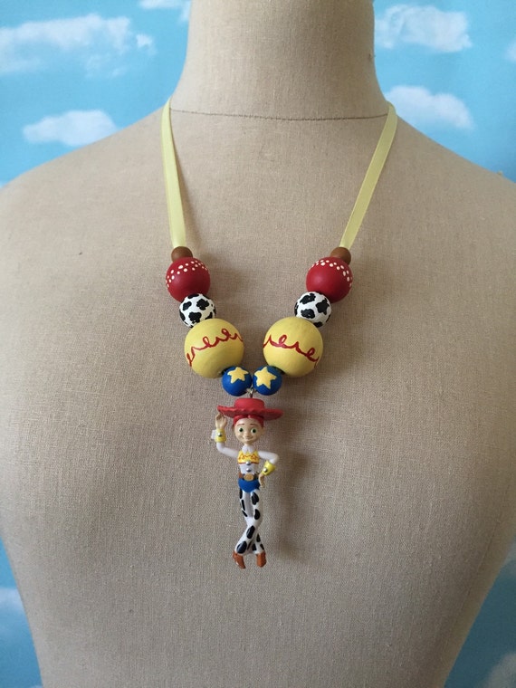 Items similar to Toy Story Jessie Hand Painted Necklace on Etsy