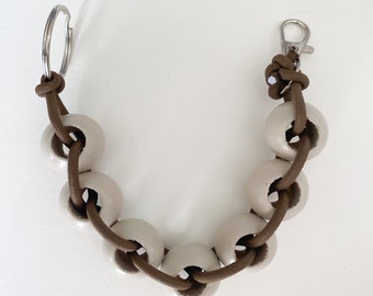 Bracelet élastique perlé/porte-clés