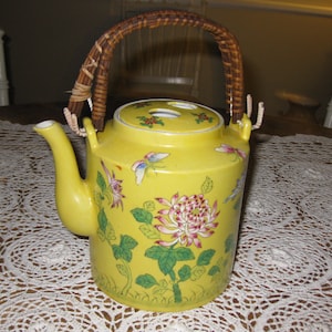 ANTIQUE TEAPOT-Gimbels Decorated in Hong Kong Yellow With Butterflies And Flowers Woven Handle 6 1/2&quot; High Removable Lid
