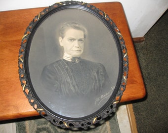 ANTIQUE PHOTOGRAPH IN Original Ornate Black and Gold Oval Frame 13" x 16" Signed J. L. Baker '09 Stern Looking Woman In Black Dress