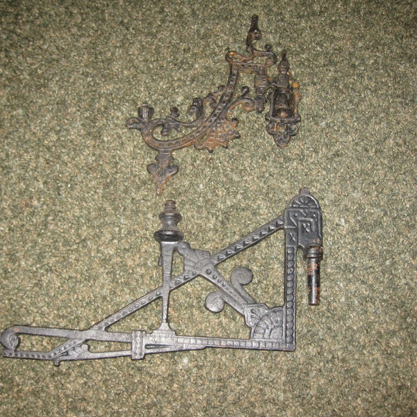 TWO CAST IRON Brackets Salvage Parts Were For Oil Lamps One 6 1/2" x 8 1/2" Has The Wall Bracket No Cup For Lamp, Second One Just Swing Arm