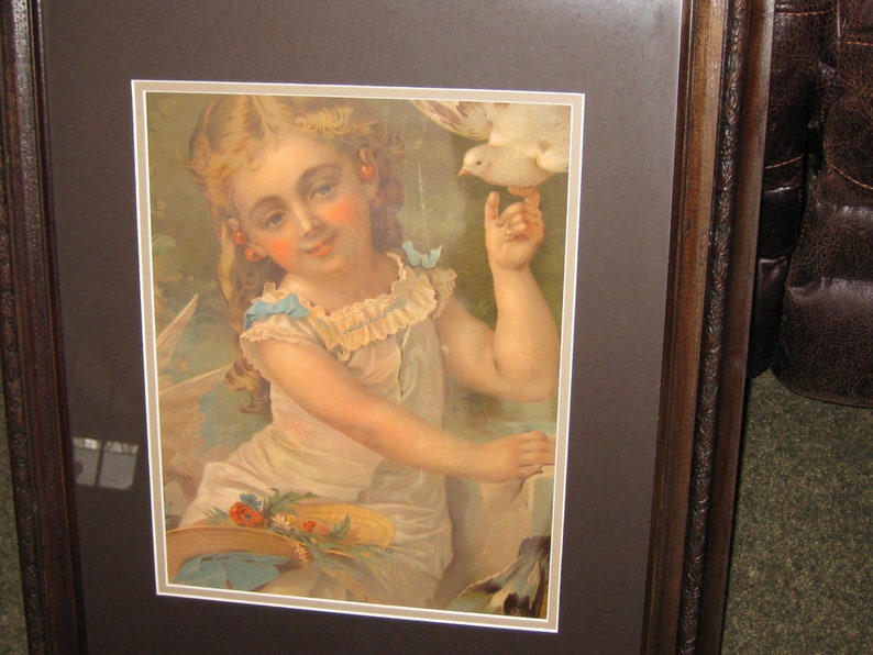 VICTORIAN CHROMOLITHOGRAPH Little Girl With Dove Wood Frame 19 12 x 23 34 Decorative Top Edge Matted In Brown Victorian Wall Art