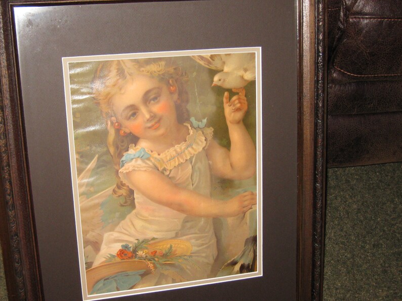 VICTORIAN CHROMOLITHOGRAPH Little Girl With Dove Wood Frame 19 12 x 23 34 Decorative Top Edge Matted In Brown Victorian Wall Art