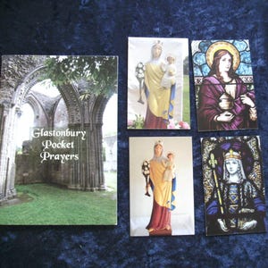May include: A collection of religious cards and a booklet. The booklet cover features an image of an arched stone structure with the text "Glastonbury Pocket Prayers." The cards depict religious figures and stained-glass art.