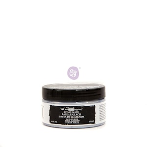 May include: A 4.1 fl oz jar of silver icing paste for crafting. The jar has a black lid and a white label with the text "art extravaganza icing paste pate de glacis pasta de glaseado old silver viel argent plata vieja".