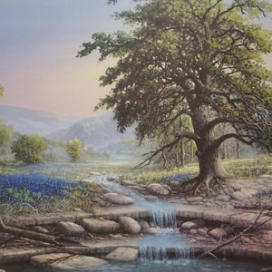 May include: A landscape painting depicts a serene scene with a large oak tree dominating the foreground. A small stream flows over a stone bridge, surrounded by blue wildflowers. The background features rolling hills and a soft, pastel sky.