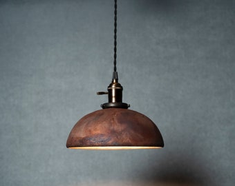 Round Raku fired hanging pendant light in copper