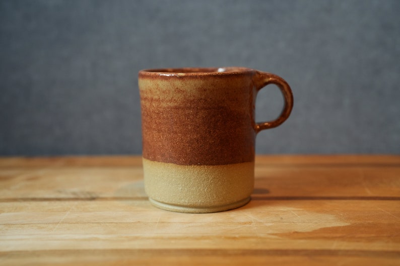 Handmade sandstone colored ceramic pottery coffee cup. image 1