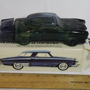 Full Vintage Avon Decanter in the shape of a Studebaker &#39;51 Car - Blue Glass Roadster-Avon Wild Country After Shave Lotion 2oz. Original Box