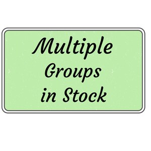May include: A trio of ceramic mugs with a speckled, matte finish in cream, light grey, and dark grey. Each mug features a simple, minimalist design, ideal for tea or coffee.