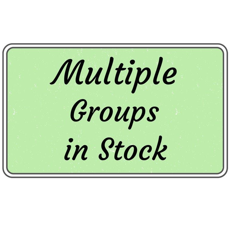 May include: A trio of ceramic mugs with a speckled, matte finish in cream, light grey, and dark grey. Each mug features a simple, minimalist design, ideal for tea or coffee.