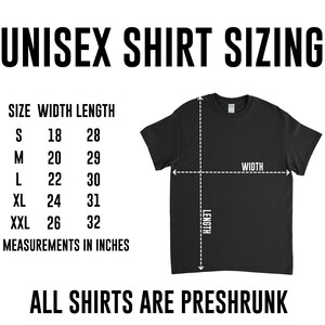 May include: Unisex t-shirt sizing chart with measurements in inches. The chart shows the width and length of the shirt in inches for sizes S, M, L, XL, and XXL. The text "ALL SHIRTS ARE PRESHRUNK" is at the bottom of the chart.