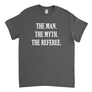 May include: A dark gray t-shirt with white text that reads "The Man. The Myth. The Referee."