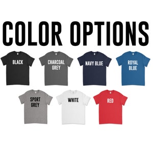 May include: Color options for a t-shirt in black, charcoal grey, navy blue, royal blue, sport grey, white, and red.