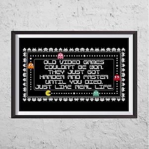 May include: Black and white pixel art design with a quote about old video games. The quote reads: "Old video games couldn't be won. They just got harder and faster until you died. Just like real life."