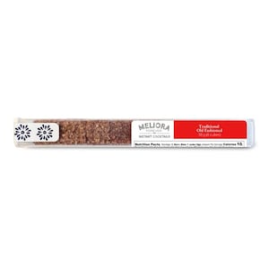 Puede incluir: Un tubo de plástico transparente que contiene cubos marrones, etiquetado como "MELIORA FOREVER INSTANT COCKTAILS". El tubo tiene una etiqueta roja que dice "Traditional Old Fashioned" y "38 g (8 cubes)". El tubo está decorado con diseños florales blancos.