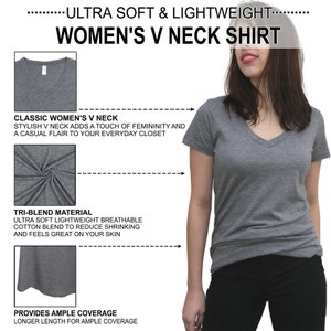May include: A gray V-neck t-shirt with short sleeves. The shirt is made of a soft, breathable tri-blend material and has a classic V-neck design. The shirt is shown on a model wearing black pants.
