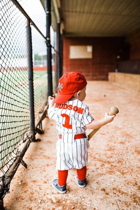 boy in baseball uniform