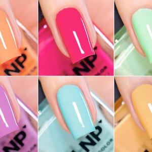 May include: Six manicured nails displaying a range of nail polish shades: orange, pink, light green, purple, turquoise, and yellow. Each nail has a glossy finish and a white vertical stripe. The bottles are labelled "NP COLOR".