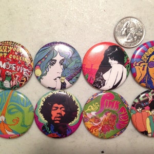 May include: Eight round, colorful, vintage-style buttons featuring psychedelic artwork. The buttons feature images of musicians, including Jimi Hendrix, Janis Joplin, and The Beatles. The buttons are approximately 1 inch in diameter.