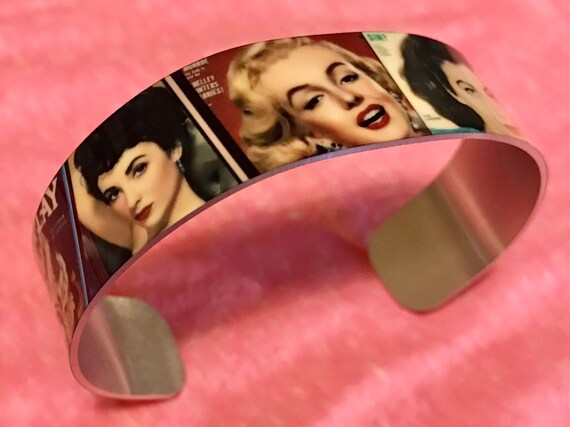 Old time movie stars on cuff bracelet.