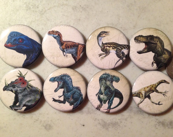 8 Dinosaur buttons, available as pinbacks, flatbacks, fridge magnets and more.  Many sizes and styles to choose from. Set 1