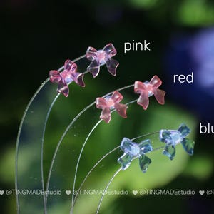 UV color change tiny bow stud earrings