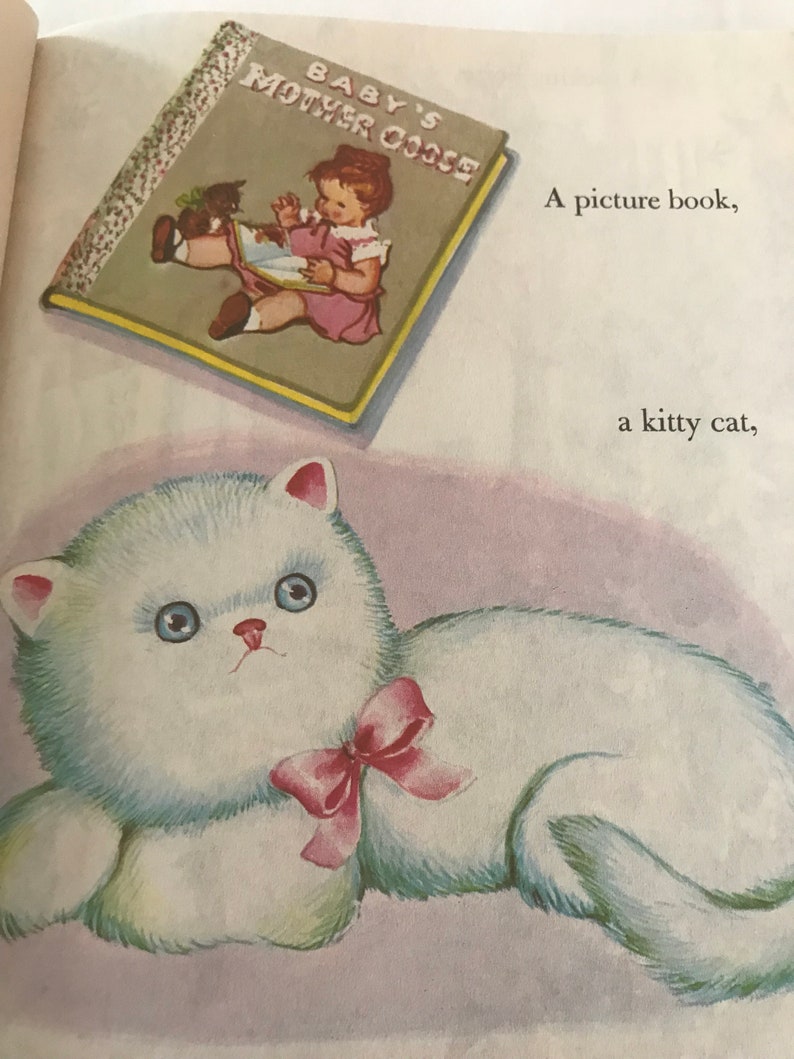 May include: Illustration from a children's book featuring a white fluffy cat with a pink bow and a book titled "Baby's Mother Goose." The book cover shows a child reading. The background is a soft pink.