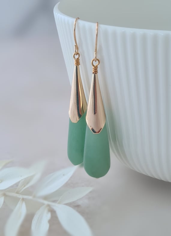 6.99 instead of 19.99 for a Green Jade Pearl Epoxy drop Earrings - save up  to 65% - LivingSocial