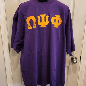 OMEGA PSI PHI Greek Letter Purple Tee Shirt/Gold Greek Letters on Purple Tee Shirt/Size Large, XLg, 3XLg Omega Tee Shirt/OpP Greek Ltr Shirt