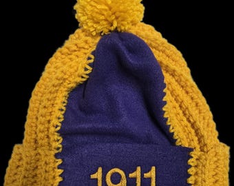 Gold Hand Crocheted n Embroidered OMEGA PSI PHI/1911 Beanie w Gold Pompom/Gold Hand Crocheted Beanie with Purple Fleece Panel