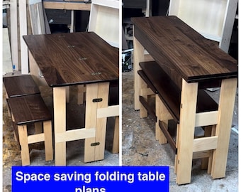 May include: A space-saving folding table with two benches. The table and benches are made of wood with a dark brown stain. The table folds in half to save space. The table is made of maple and walnut wood. The text "Space saving folding table plans" is visible in the image.