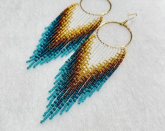 Long Handcrafted turquoise seed beads earrings. Bohemia fringe earrings in white, gold  azure ombre.