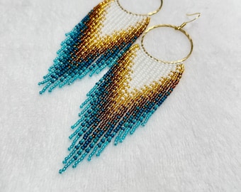 Long Handcrafted turquoise seed beads earrings. Bohemia fringe earrings in white, gold  azure ombre.