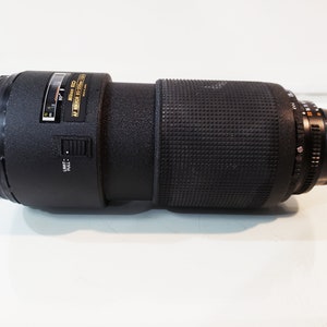Nikon ED AF NIKKOR 80-200 mm f/2.8D Japón - Nikon L37c 77 mm