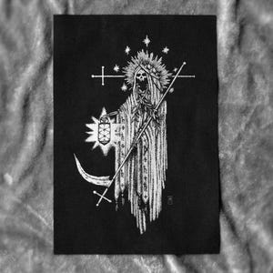 May include: Black and white illustration of a robed skeletal figure holding a lantern and a scythe. The figure has a halo and is adorned with a crown. The artwork features cross and star motifs.