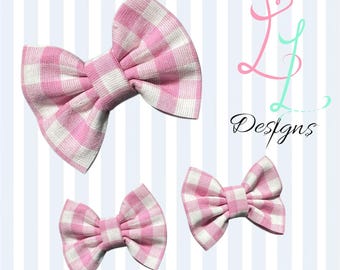 Made to match hair bows. Pink and white  Gingham pigtails. Fabric MTM hair clips