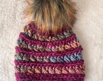 Children's Winter Hat (2-10 years) (18-20 inch). This is super soft, perfect for winter time. Vibrant colors. Pom is removable for washing.