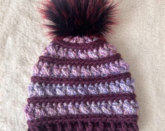 Children's Winter Hat (2-10 years) (18-20 inch). This is super soft, perfect for winter time. Vibrant colors. Pom is removable for washing.