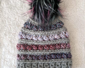 Children's Winter Hat (2-10 years) (18-20 inch). This is super soft, perfect for winter time. Vibrant colors. Pom is removable for washing.